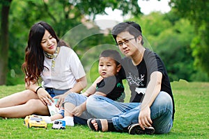 Happy latino family reading book