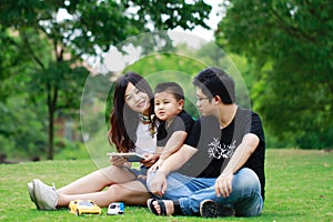 Happy latino family reading book