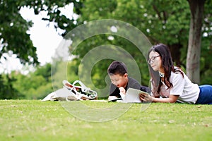 Happy latino family reading book