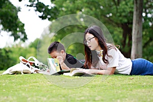 Happy latino family reading book