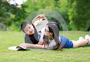 Happy latino family reading book