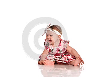 Happy laughing baby girl in fashion wear portrait