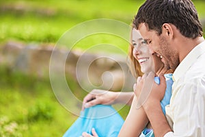 Happy Laughing Caucasian Couple Having Fun Outdoors and Embracing