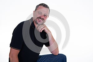 Happy laughing guy posing  handsome middle aged man in casual shirt isolated over white background in male portrait concept
