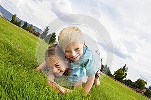 Happy laughing Kids Playing Outdoors