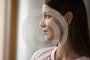 Happy laughing young woman getting order from internet store.