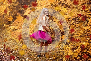 Happy Lifestyle portrait of a beautiful young model blond girl outdoors. girl in park. Autumn season. Portrait of a beautiful girl