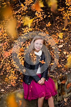 Happy Lifestyle portrait of a beautiful young model blond girl outdoors. girl in park. Autumn season. Portrait of a beautiful girl