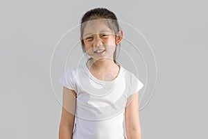 Happy Little Asian Child with White T-Shirt, Isolated on White Background
