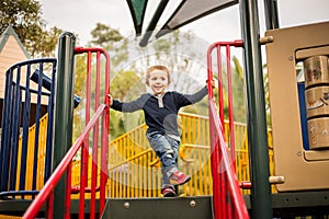 Happy little boy on the playground