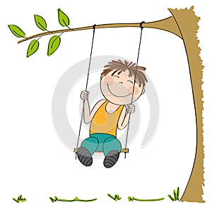 Happy little boy sitting on swing, swinging under the tree