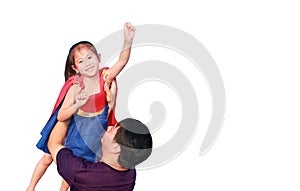 Happy little child daughter in superhero dress with father lifting up isolated on white sky background. Kid girl enjoy playing