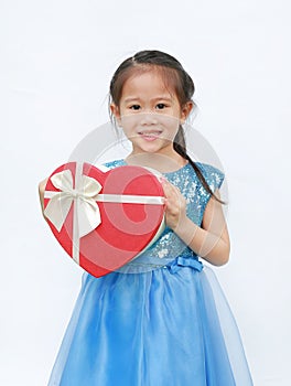 Happy little child girl with red heart gift box isolated on white background. Concept Valentine`s Day