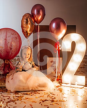 Happy little girl celebrating birthday party