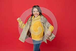 Happy little girl child wear casual fashion style for keeping warm and comfortable in fall season, autumn