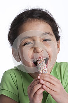 Happy Little Girl Is Eating Icecream