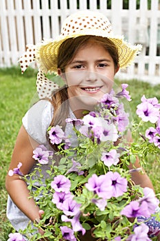 Happy little girl with flowers