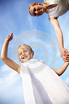 Happy little girl and her mother