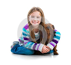 Happy little girl with her â€‹â€‹dachshund