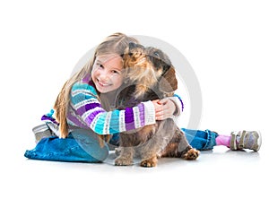 Happy little girl with her â€‹â€‹dachshund