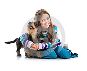 Happy little girl with her â€‹â€‹dachshund