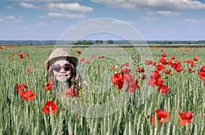Happy little girl in meadow