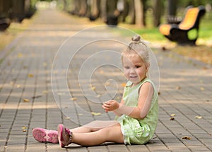 Happy little girl in the park