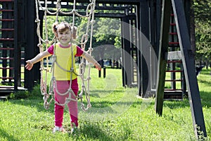 Happy little girl playground