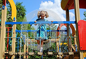 Happy little girl on playground