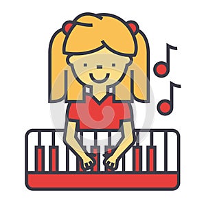 Happy little girl playing on piano, pianist concept.