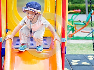 Happy little girl playing at the playground. Children, Happy, Fa