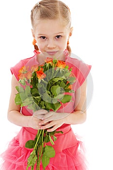 Happy little girl with rose in red clothes