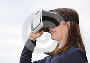 Happy little girl with VR Visor photo