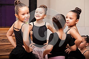 Happy little girls in ballet class