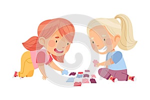 Happy Little Girls Playing Jigsaw Puzzle on the Floor Vector Illustration