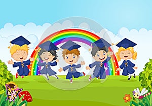 Happy little kids celebrate their graduation with nature background