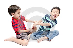 Happy little sibling boy use tablet on white background