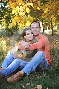 Happy love couple portraits looking at camera