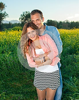 Happy loving attractive young couple.