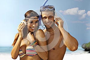 Happy loving couple on the beach