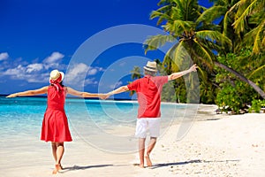 Happy loving couple on tropical beach