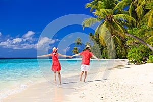 Happy loving couple on tropical beach