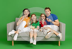 Happy loving family on bright color background