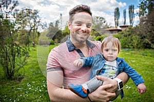 Happy loving family. father and child in the park