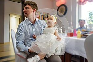 Happy loving family. Father and his daughter child girl playing and hugging outdoors. Cute little girl hugs daddy. Concept of