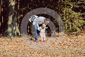 Happy loving family. Father and his daughter child girl playing and hugging outdoors. Cute little girl hugs daddy. Concept of