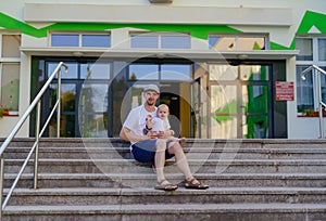 Happy loving family. Father and his daughter child girl playing and hugging outdoors. Cute little girl hugs daddy. Concept of