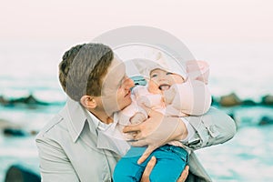 Happy loving family. Father and his daughter child girl playing together.