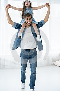Happy loving family. Father and his daughter child girl playing together. Father`s day concept