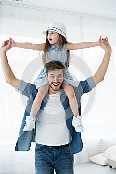 Happy loving family. Father and his daughter child girl playing together. Father`s day concept